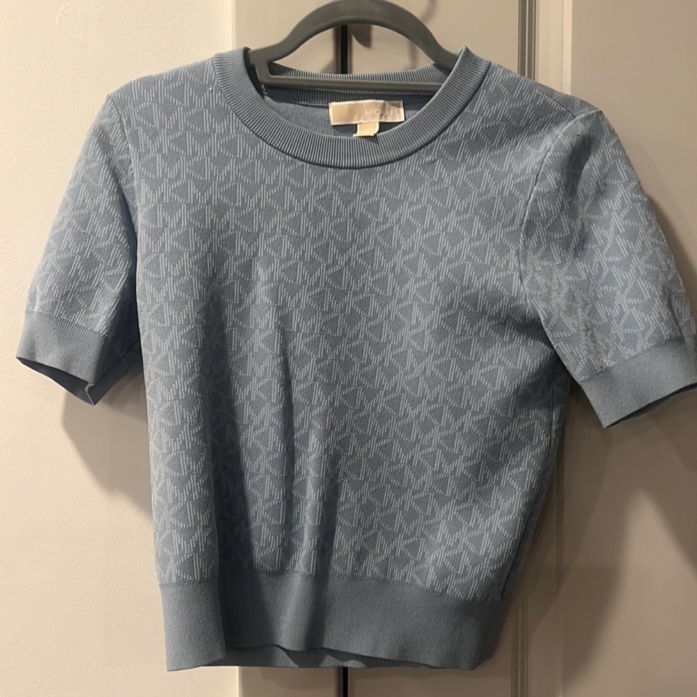 Micheal Kors light blue sweater top.